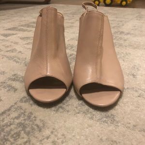 Blush colored peep-toe strappy heels